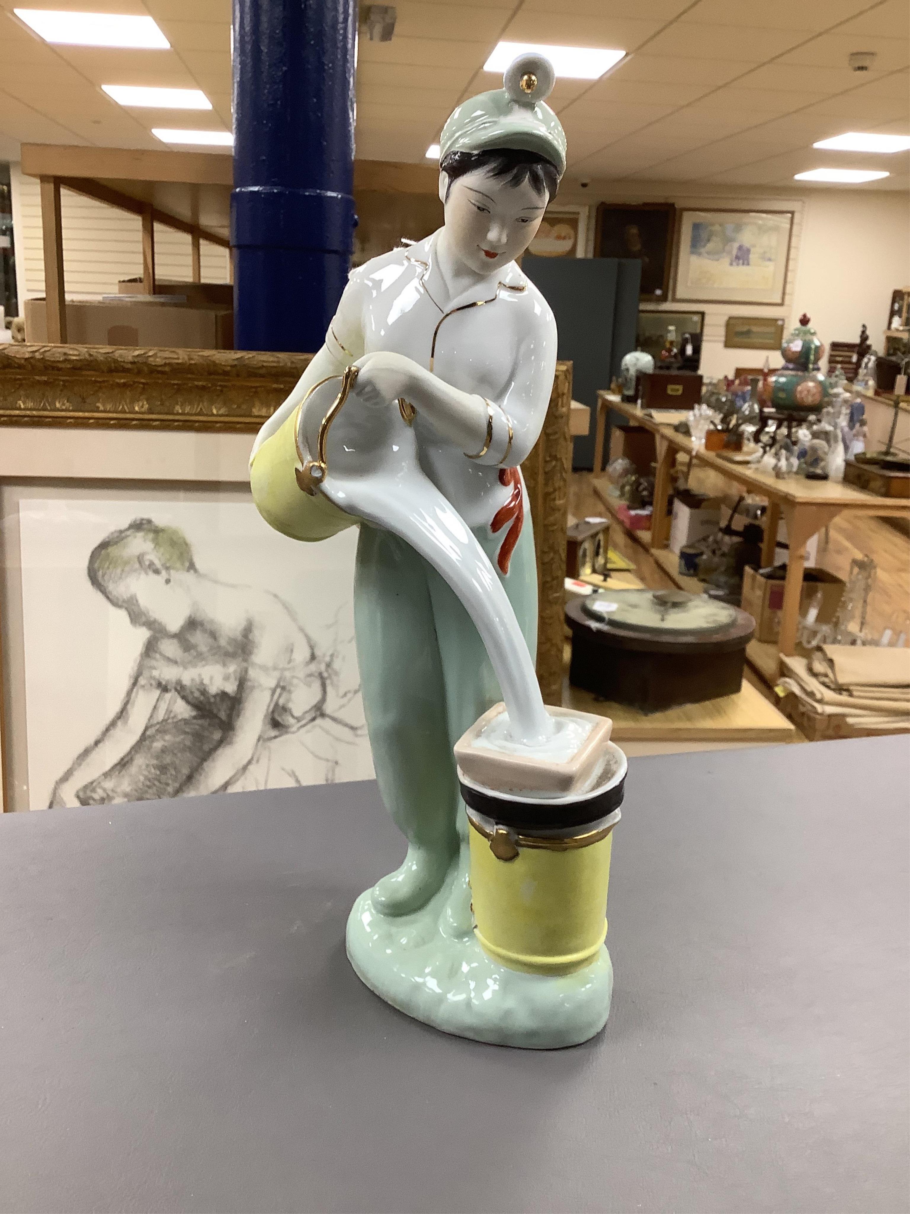 Two Chinese Cultural Revolution female figures, Tallest 42cm high. Condition - one figure face cracked, the other has wear to gilding.